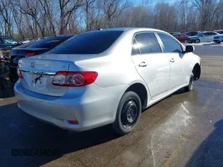 2011 Toyota Corolla L with VIN JTDBU4EE8B9167374, listed as a IAAI auction lot 41312318 with 189,903 mi miles. Bid and sale history available at carsss.com. Image 4.
