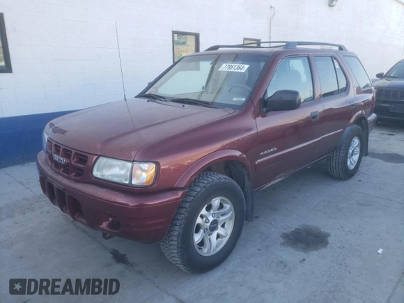 2002 Isuzu Rodeo S with VIN 4S2DM58W824313096, listed as a Copart auction lot 77951364 with 127,470 mi miles and Salvage Title. Bid and sale history available at DreamBid. Image 1.