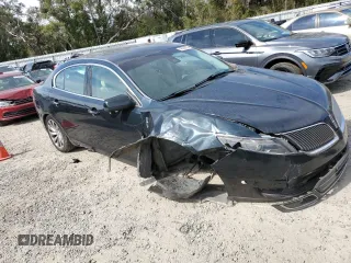 2014 Lincoln MKS с VIN 1LNHL9DK5EG609220, выставлен на аукционе Copart как лот 42928365 с пробегом Не указан миль и Списание • Salvage title. История ставок и продаж доступна на DreamBid. Изображение 4.