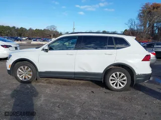 2018 Volkswagen Tiguan SEL with VIN 3VV2B7AX9JM134884, listed as a IAAI auction lot 41181294 with 130,350 mi miles. Bid and sale history available at carsss.com. Image 14.