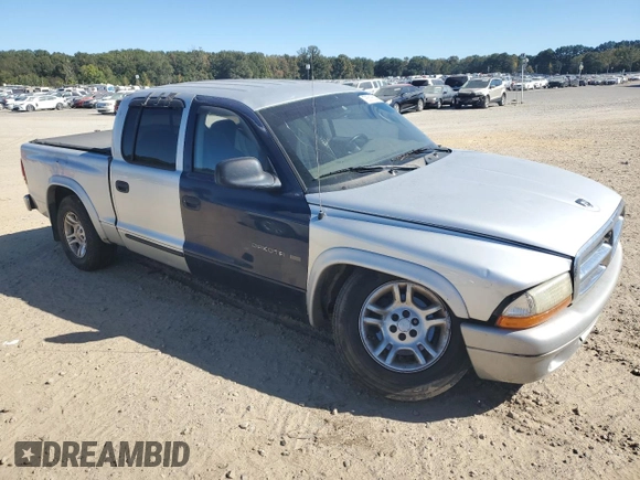 2003 Dodge Dakota SLT with VIN 1D7HL48X33S340079, listed as a Copart auction lot 76516514 with 295,350 mi miles and Clean Title. Bid and sale history available at carsss.com. Image 4.