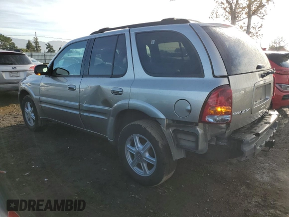 2002 Oldsmobile Bravada z VIN 1GHDT13S422153610, wystawiony jako Copart lot #85975214 z przebiegiem 66 111 mil mil oraz Szkoda całkowita • Salvage title. Historia ofert i sprzedaży dostępna na DreamBid. Obrazek 2.