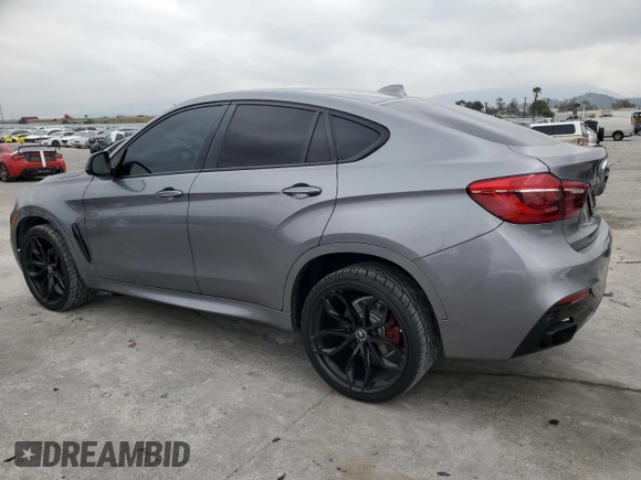 2018 BMW X6 sDrive35i with VIN 5UXKU0C52J0G81057, listed as a Copart auction lot 50698205 with 67,735 mi miles and Salvage Title. Bid and sale history available at carsss.com. Image 2.