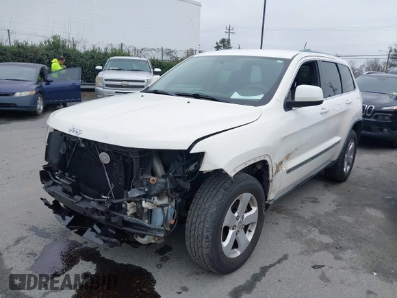 2011 Jeep Grand Cherokee Laredo with VIN 1J4RS4GG2BC709861, listed as a IAAI auction lot 41570812 with 178,226 mi miles and . Bid and sale history available at DreamBid. Image 2.