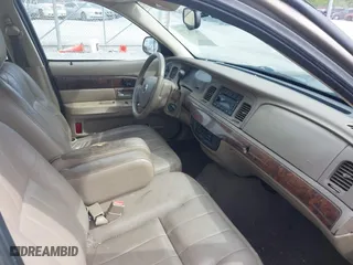 2005 Mercury Grand Marquis LS Premium with VIN 2MEFM75W35X654244, listed as a IAAI auction lot 42090783 with 120,033 mi miles. Bid and sale history available at carsss.com. Image 5.