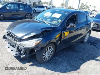 2016 Scion iA z VIN 3MYDLBZV0GY123351, wystawiony jako IAAI lot #41736327 z przebiegiem 86 804 mil mil oraz . Historia ofert i sprzedaży dostępna na DreamBid. Obrazek 17.