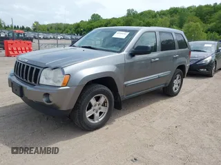 2007 Jeep Grand Cherokee Laredo z VIN 1J8GR48K77C660281, wystawiony jako IAAI lot #42293216 z przebiegiem 242 714 mil mil oraz . Historia ofert i sprzedaży dostępna na DreamBid. Obrazek 2.