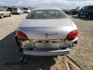 2001 Chrysler LHS z VIN 2C3HC56G11H643759, wystawiony jako Copart lot #70924974 z przebiegiem 124 263 mil mil oraz Tytuł czysty. Historia ofert i sprzedaży dostępna na DreamBid. Obrazek 6.