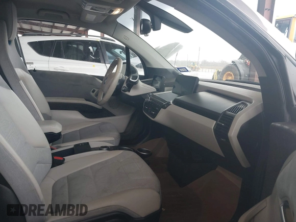2014 BMW i3 with VIN WBY1Z4C57EV276127, listed as a IAAI auction lot 41531408 with 105,696 mi miles and . Bid and sale history available at DreamBid. Image 5.