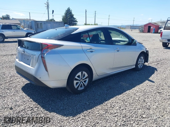 2017 Toyota Prius Two with VIN JTDKBRFU7H3574039, listed as a IAAI auction lot 42410071 with 101,080 mi miles and . Bid and sale history available at DreamBid. Image 4.