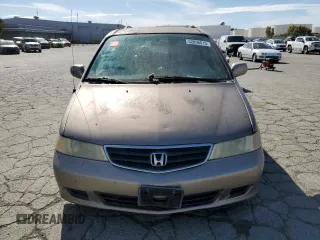 2003 Honda Odyssey EX-L z VIN 5FNRL18043B154662, wystawiony jako Copart lot #52896015 z przebiegiem 216 099 mil mil oraz Szkoda całkowita • Salvage title. Historia ofert i sprzedaży dostępna na DreamBid. Obrazek 5.