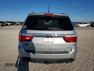 2013 Dodge Durango Crew with VIN 1C4SDHDT0DC590172, listed as a Copart auction lot 80140034 with 135,078 mi miles and Salvage title. Bid and sale history available at DreamBid. Image 6.