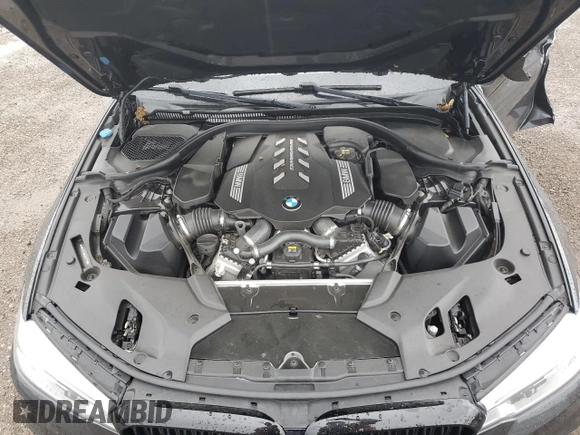 2020 BMW 5 Series M550i xDrive with VIN WBAJS7C06LCD12779, listed as a Copart auction lot 61136215 with 81,286 mi miles and Salvage title. Bid and sale history available at DreamBid. Image 11.