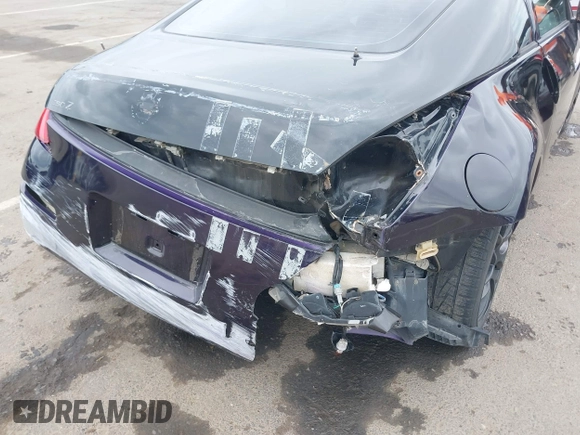 2005 Nissan 350Z Enthusiast z VIN JN1AZ34D25M605438, wystawiony jako IAAI lot #42131179 z przebiegiem 143 157 mil mil oraz . Historia ofert i sprzedaży dostępna na DreamBid. Obrazek 6.