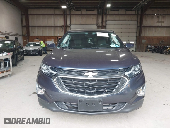 2018 Chevrolet Equinox LT z VIN 3GNAXSEV7JL367487, wystawiony jako IAAI lot #42228399 z przebiegiem 33 710 mil mil oraz . Historia ofert i sprzedaży dostępna na DreamBid. Obrazek 12.