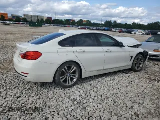 2015 BMW 4 Series 428i xDrive with VIN WBA4A7C53FD415066, listed as a Copart auction lot 61880545 with 130,874 mi miles and Salvage title. Bid and sale history available at DreamBid. Image 3.