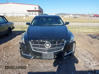 2014 Cadillac CTS Luxury AWD z VIN 1G6AX5SX9E0177017, wystawiony jako IAAI lot #42038429 z przebiegiem 113 656 mil mil oraz . Historia ofert i sprzedaży dostępna na DreamBid. Obrazek 12.