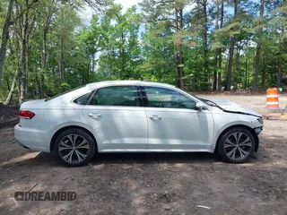 2021 Volkswagen Passat SE with VIN 1VWSA7A38MC014396, listed as a IAAI auction lot 42201818 with 62,193 mi miles and . Bid and sale history available at DreamBid. Image 14.