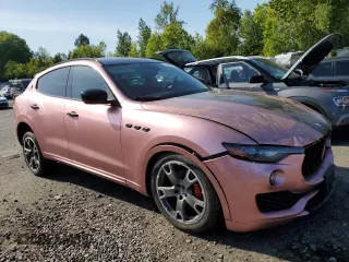 2017 Maserati Levante with VIN ZN661XUS1HX243202, listed as a Copart auction lot 55456535 with 77,738 mi miles and Salvage Title. Bid and sale history available at carsss.com. Image 4.