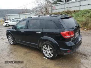 2014 Dodge Journey R/T with VIN 3C4PDDFG4ET117900, listed as a Copart auction lot 80911244 with 111,773 mi miles and Clean title. Bid and sale history available at DreamBid. Image 2.
