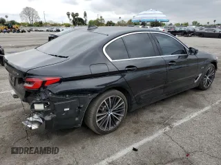 2023 BMW 5 Series 530e with VIN WBA13AG01PCM24624, listed as a Copart auction lot 55149855 with 26,022 mi miles and Salvage title. Bid and sale history available at DreamBid. Image 3.