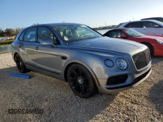 2019 Bentley Bentayga V8 z VIN SJAAM2ZV4KC024727, wystawiony jako Copart lot #74625214 z przebiegiem Nie podano mil oraz Nie do naprawy • Non repairable. Historia ofert i sprzedaży dostępna na DreamBid. Obrazek 4.