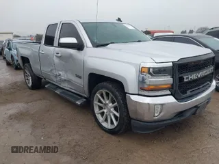 2018 Chevrolet Silverado 1500 LT with VIN 1GCRCREC4JZ287085, listed as a IAAI auction lot 41450057 with 79,275 mi miles and . Bid and sale history available at DreamBid. Image 1.