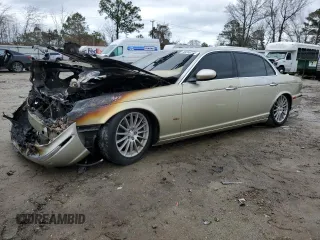 2006 Jaguar XJ with VIN SAJWA79B76SH08803, listed as a Copart auction lot 40268774 with 0 mi miles and Salvage Title. Bid and sale history available at carsss.com. Image 1.