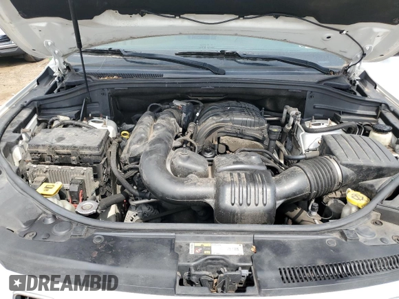 2014 Jeep Grand Cherokee Laredo with VIN 1C4RJFAG4EC119033, listed as a Copart auction lot 54064845 with 321,696 mi miles and Clean Title. Bid and sale history available at DreamBid. Image 12.