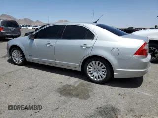 2010 Ford Fusion Hybrid z VIN 3FADP0L39AR273836, wystawiony jako Copart lot #54815095 z przebiegiem 245 960 mil mil oraz Czysty tytuł • Clean title. Historia ofert i sprzedaży dostępna na DreamBid. Obrazek 2.
