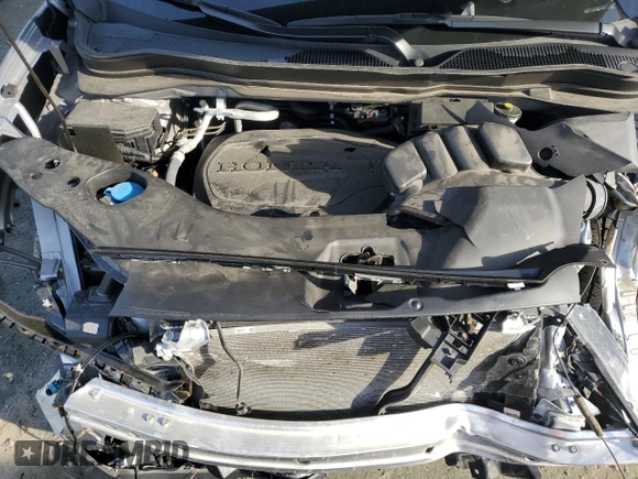 2022 Honda Passport Elite z VIN 5FNYF8H05NB029121, wystawiony jako Copart lot #84228064 z przebiegiem 25 154 mil mil oraz Szkoda całkowita • Salvage title. Historia ofert i sprzedaży dostępna na DreamBid. Obrazek 12.