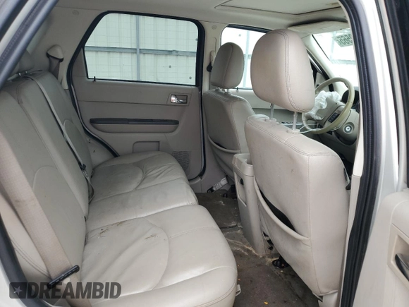 2008 Mercury Mariner Premier z VIN 4M2CU97188KJ41798, wystawiony jako Copart lot #43960565 z przebiegiem 154 302 mil mil oraz Szkody całkowita. Historia ofert i sprzedaży dostępna na DreamBid. Obrazek 10.