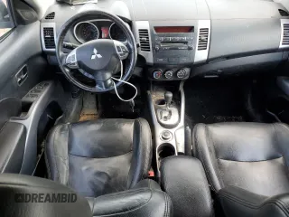 2010 Mitsubishi Outlander z VIN JA4AT2AWXAZ606259, wystawiony jako Copart lot #65532304 z przebiegiem 256 081 mil mil oraz Szkoda całkowita • Salvage title. Historia ofert i sprzedaży dostępna na DreamBid. Obrazek 8.