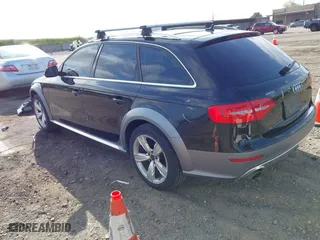 2014 Audi allroad Premium Plus with VIN WA1UFAFLXEA020789, listed as a IAAI auction lot 41959838 with 133,520 mi miles. Bid and sale history available at carsss.com. Image 3.