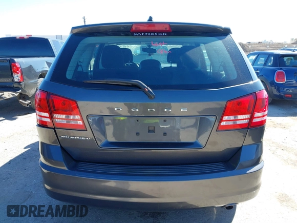 2015 Dodge Journey SE z VIN 3C4PDCAB5FT739266, wystawiony jako IAAI lot #41725086 z przebiegiem 134 109 mil mil oraz . Historia ofert i sprzedaży dostępna na DreamBid. Obrazek 16.