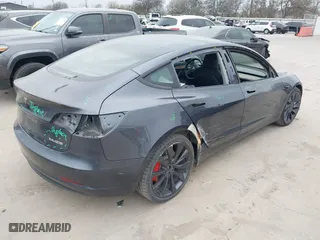 2022 Tesla Model 3 Performance with VIN 5YJ3E1EC9NF130410, listed as a IAAI auction lot 41711708 with 26,937 mi miles. Bid and sale history available at carsss.com. Image 4.