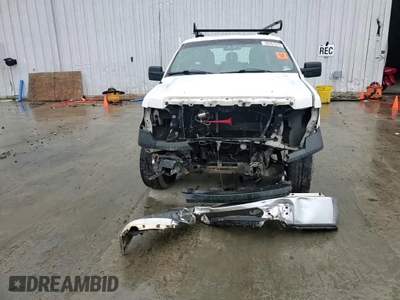 2013 Ford F-150 XL z VIN 1FTFX1CT2DKF61201, wystawiony jako Copart lot #58761215 z przebiegiem Nie podano mil oraz Szkoda całkowita • Salvage title. Historia ofert i sprzedaży dostępna na DreamBid. Obrazek 13.