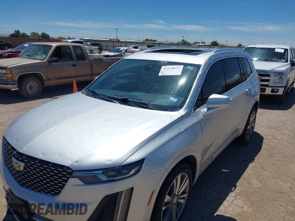 2020 Cadillac XT6 FWD Premium Luxury with VIN 1GYKPCRS7LZ104392, listed as a IAAI auction lot 42278675 with 81,001 mi miles and . Bid and sale history available at DreamBid. Image 6.