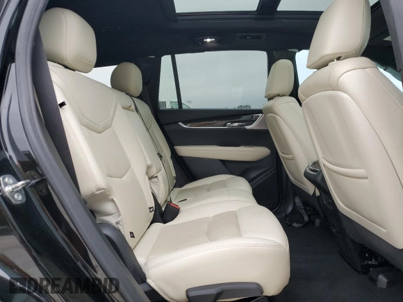 2023 Cadillac XT6 AWD Sport z VIN 1GYKPGRS6PZ126039, wystawiony jako Copart lot #55948605 z przebiegiem 39 966 mil mil oraz Szkoda całkowita • Salvage title. Historia ofert i sprzedaży dostępna na DreamBid. Obrazek 11.