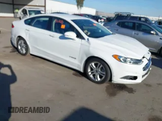 2015 Ford Fusion SE Hybrid with VIN 3FA6P0LU3FR249444, listed as a IAAI auction lot 41602659 with 145,024 mi miles. Bid and sale history available at carsss.com. Image 1.