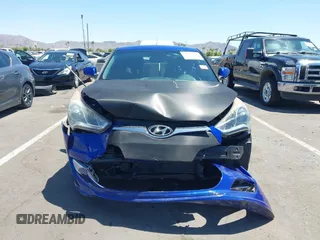 2013 Hyundai Veloster w/Gray Int z VIN KMHTC6AD3DU134956, wystawiony jako IAAI lot #42560944 z przebiegiem 108 166 mil mil oraz . Historia ofert i sprzedaży dostępna na DreamBid. Obrazek 13.