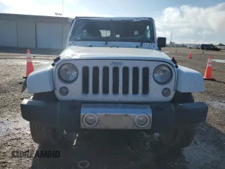 2016 Jeep Wrangler Unlimited Sahara with VIN 1C4BJWEG6GL301301, listed as a Copart auction lot 54362595 with 110,295 mi miles and Salvage title. Bid and sale history available at DreamBid. Image 5.