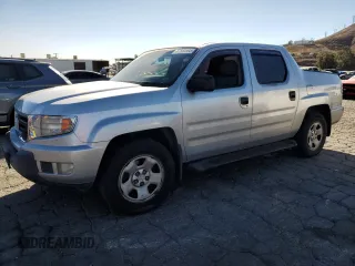 2010 Honda Ridgeline RT with VIN 5FPYK1F28AB004741, listed as a Copart auction lot 87883695 with 258,611 mi miles and Salvage Title. Bid and sale history available at carsss.com. Image 1.