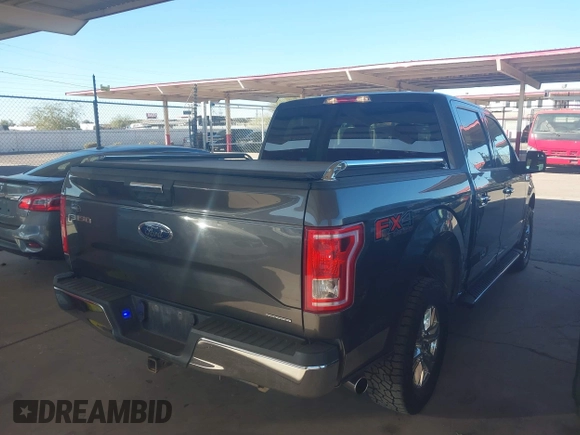 2015 Ford F-150 XLT with VIN 1FTEW1EF6FFB13321, listed as a IAAI auction lot 41381008 with 118,732 mi miles. Bid and sale history available at carsss.com. Image 4.