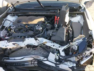2024 Toyota Camry LE z VIN 4T1R11AK6RU888622, wystawiony jako IAAI lot #41102520 z przebiegiem 12 717 mil mil oraz . Historia ofert i sprzedaży dostępna na DreamBid. Obrazek 10.