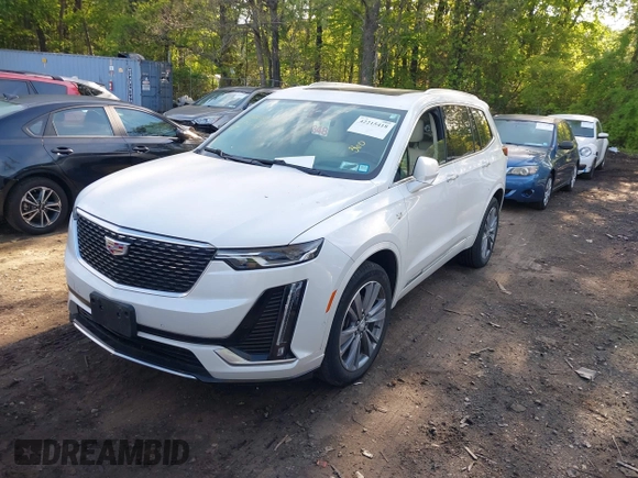 2022 Cadillac XT6 Premium Luxury z VIN 1GYKPDRS3NZ124924, wystawiony jako IAAI lot #42215418 z przebiegiem 32 368 mil mil oraz . Historia ofert i sprzedaży dostępna na DreamBid. Obrazek 18.