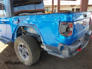 2021 Jeep Gladiator Rubicon with VIN 1C6JJTBGXML516164, listed as a IAAI auction lot 41837544 with 48,197 mi miles and . Bid and sale history available at DreamBid. Image 6.