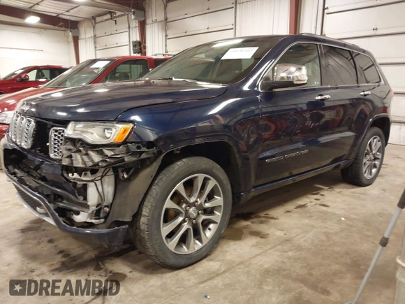 2017 Jeep Grand Cherokee Overland with VIN 1C4RJFCG3HC693897, listed as a IAAI auction lot 41636323 with 105,575 mi miles. Bid and sale history available at carsss.com. Image 2.