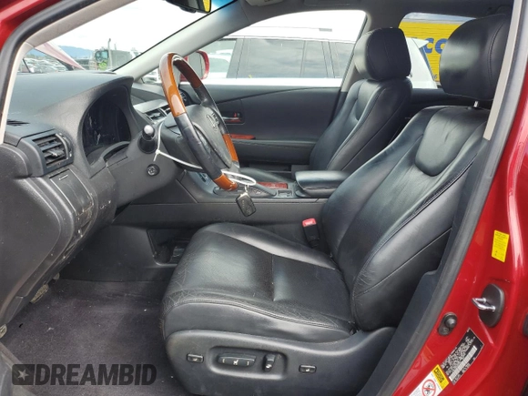 2010 Lexus RX 450h with VIN JTJBC1BAXA2403465, listed as a Copart auction lot 51248335 with 128,932 mi miles and Salvage Title. Bid and sale history available at DreamBid. Image 7.