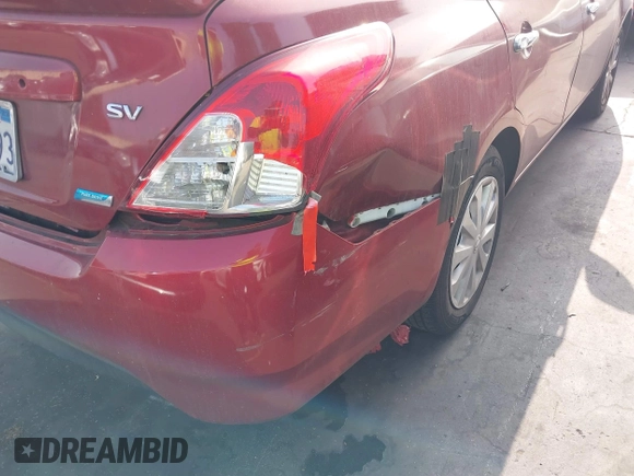 2016 Nissan Versa SV with VIN 3N1CN7AP0GL866431, listed as a IAAI auction lot 41017735 with 104,683 mi miles. Bid and sale history available at carsss.com. Image 14.